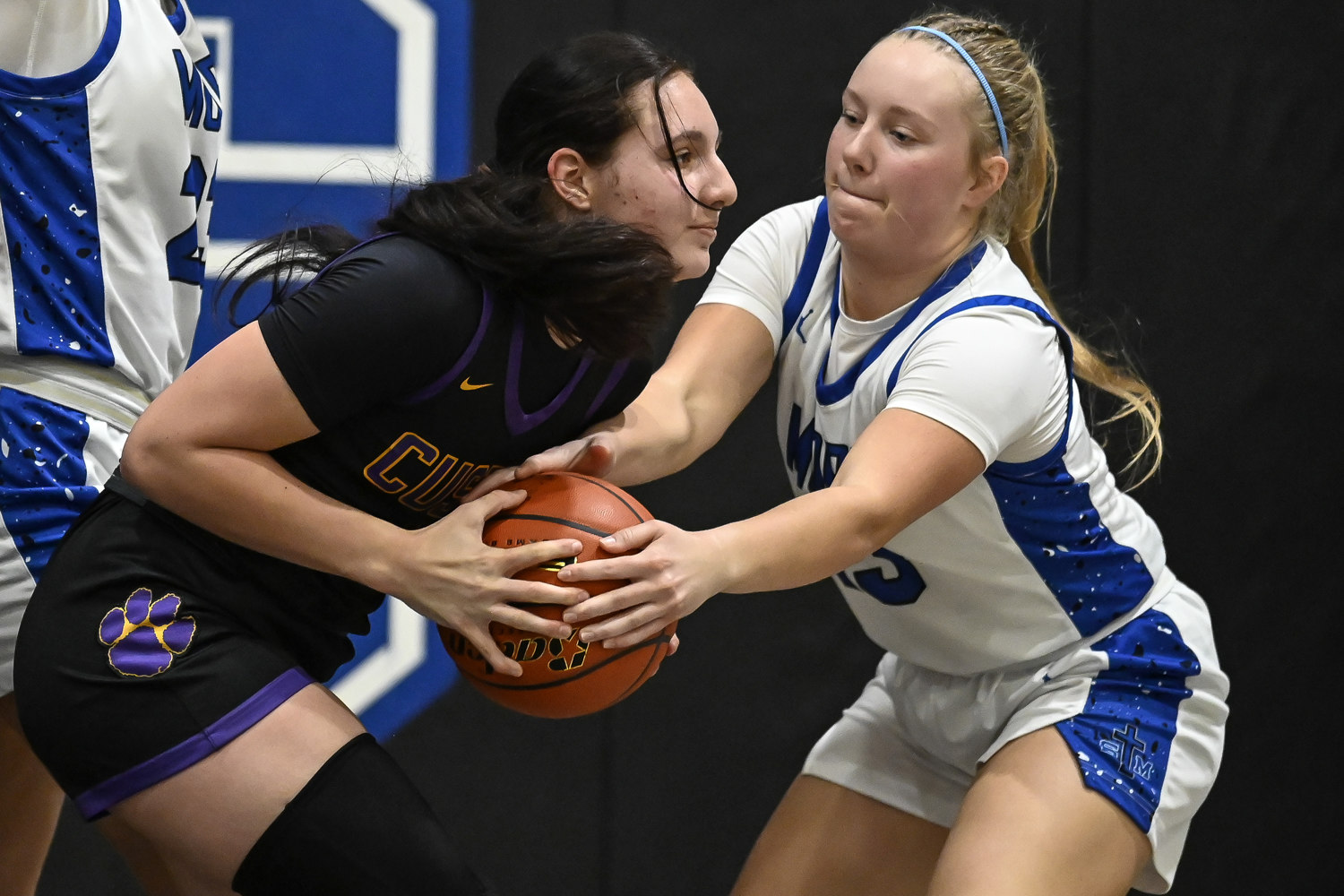 PHOTO GALLERY: Action from Custer girls at St. Thomas More