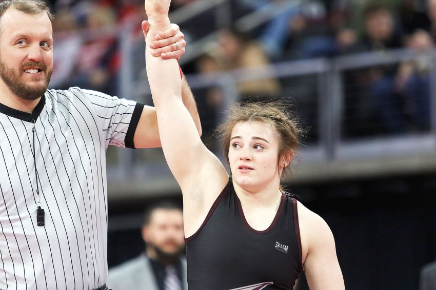 Spearfishâ€™s Taylor Graveman lighting the torch for South Dakota girls wrestling