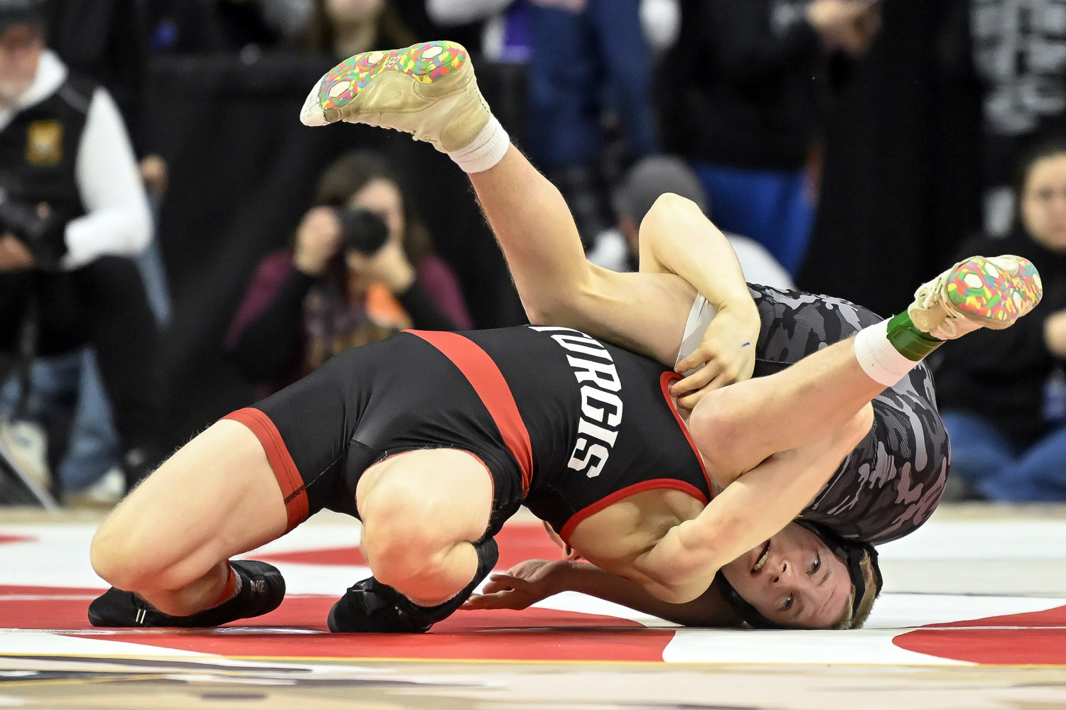 PHOTO GALLERY: Boys state wrestling quarterfinal action