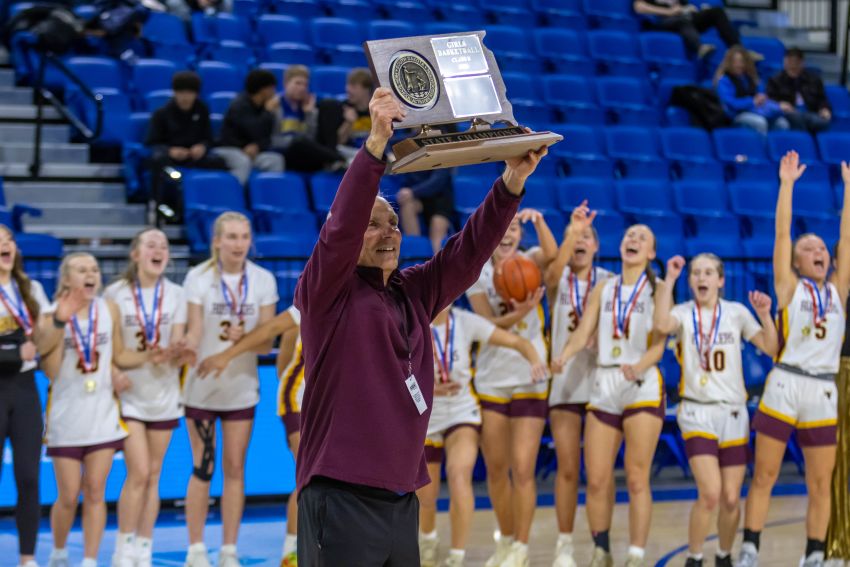 Tom Young, Ethan Rustlers lift up community with state basketball championship