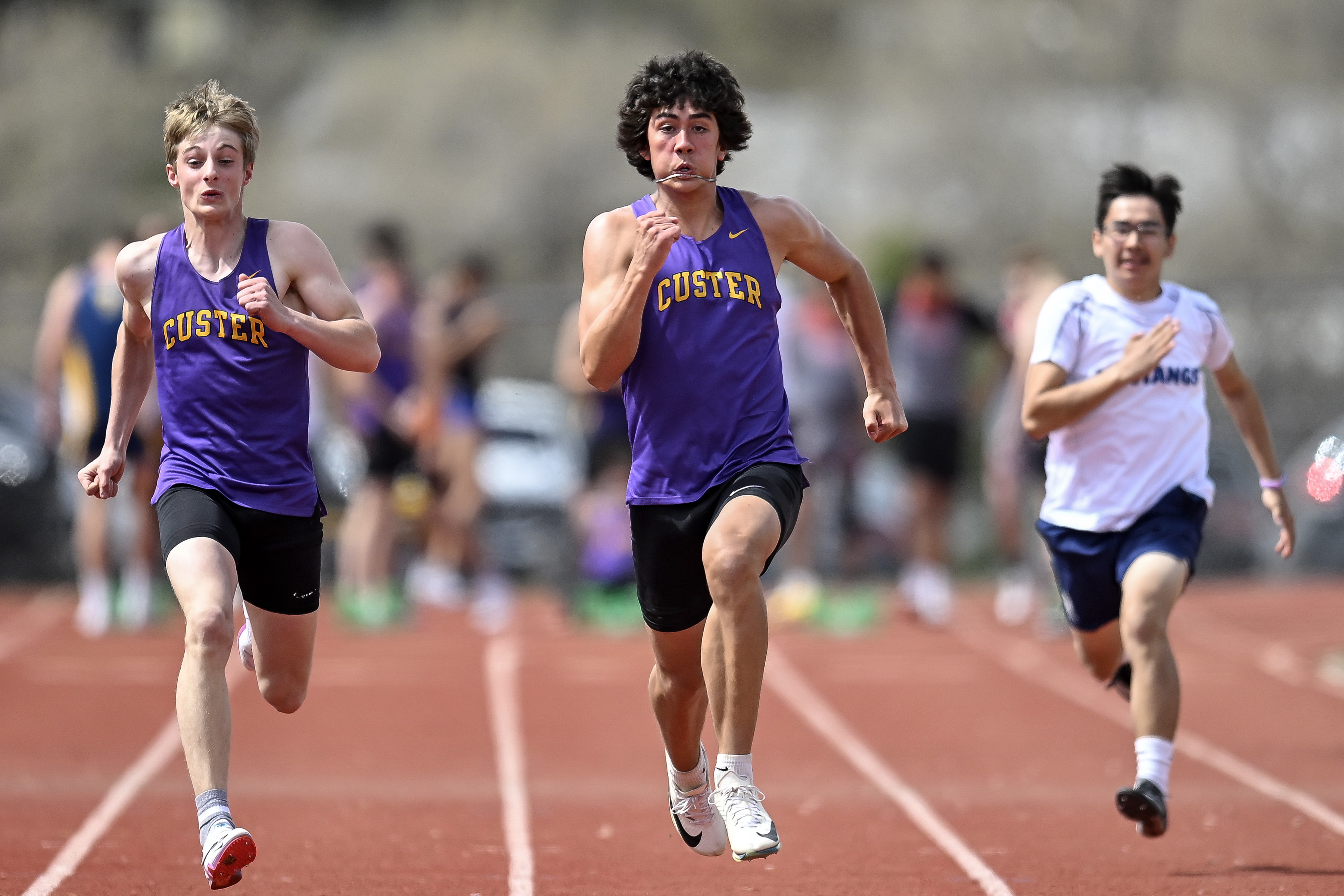 PHOTO GALLERY: Action from the Custer Invitational track meet