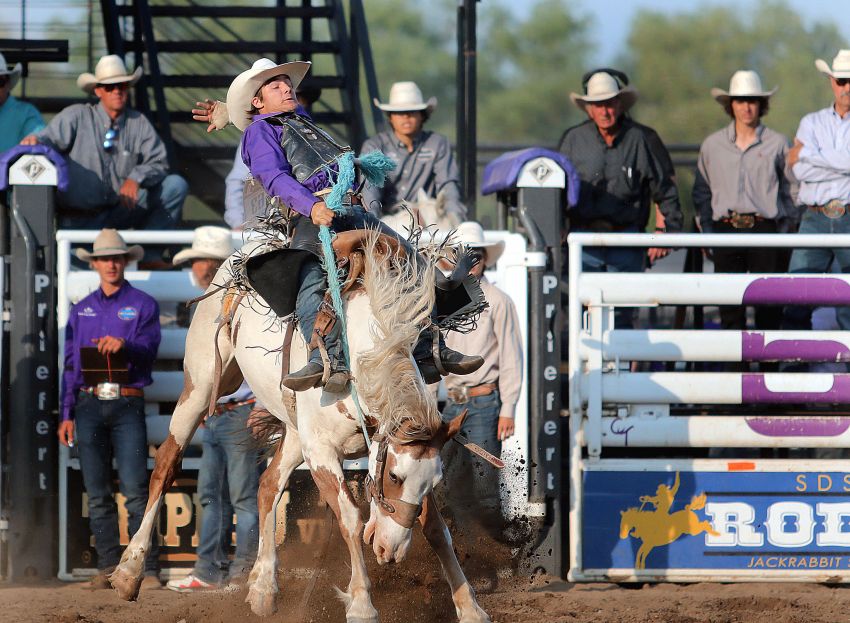 Bronc riders Thayne Elshere and Eastan West catapult South Dakota boys into third place at National High School Finals Rodeo 