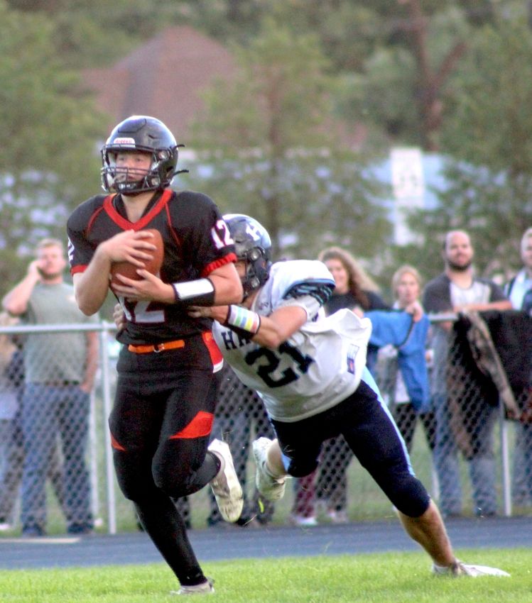 Howard builds early lead, holds off Hanson in top-five matchup