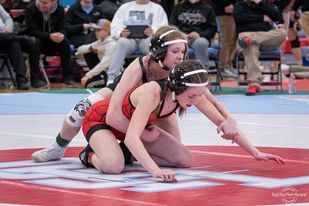Brandon Valleyâ€™s Mary-Katherine Joseph sits on top of loaded 106 weight class