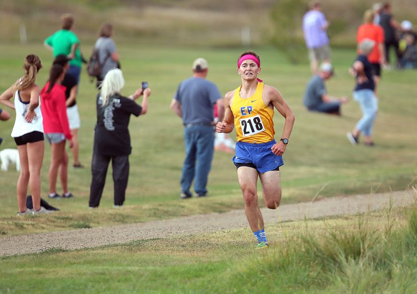 Evan Bartelt and Kinsey Evans run to cross-country titles at SESD meet